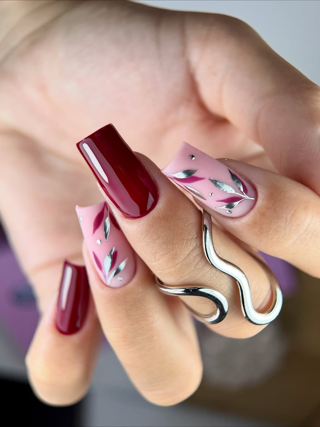 Deep Burgundy and Pink Leaf Accent Nails