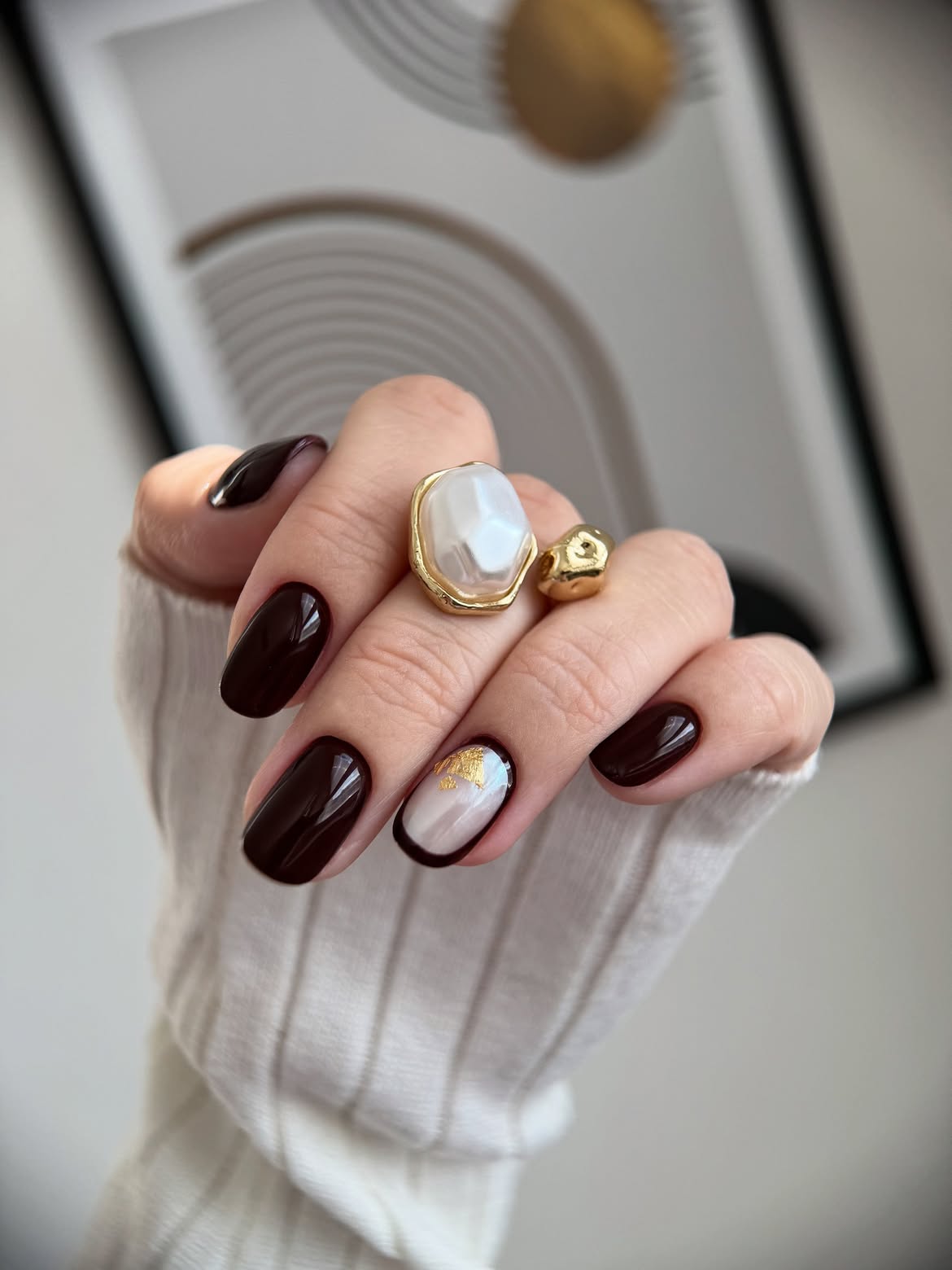 Deep Chocolate Oval Nails With Pearl Accent
