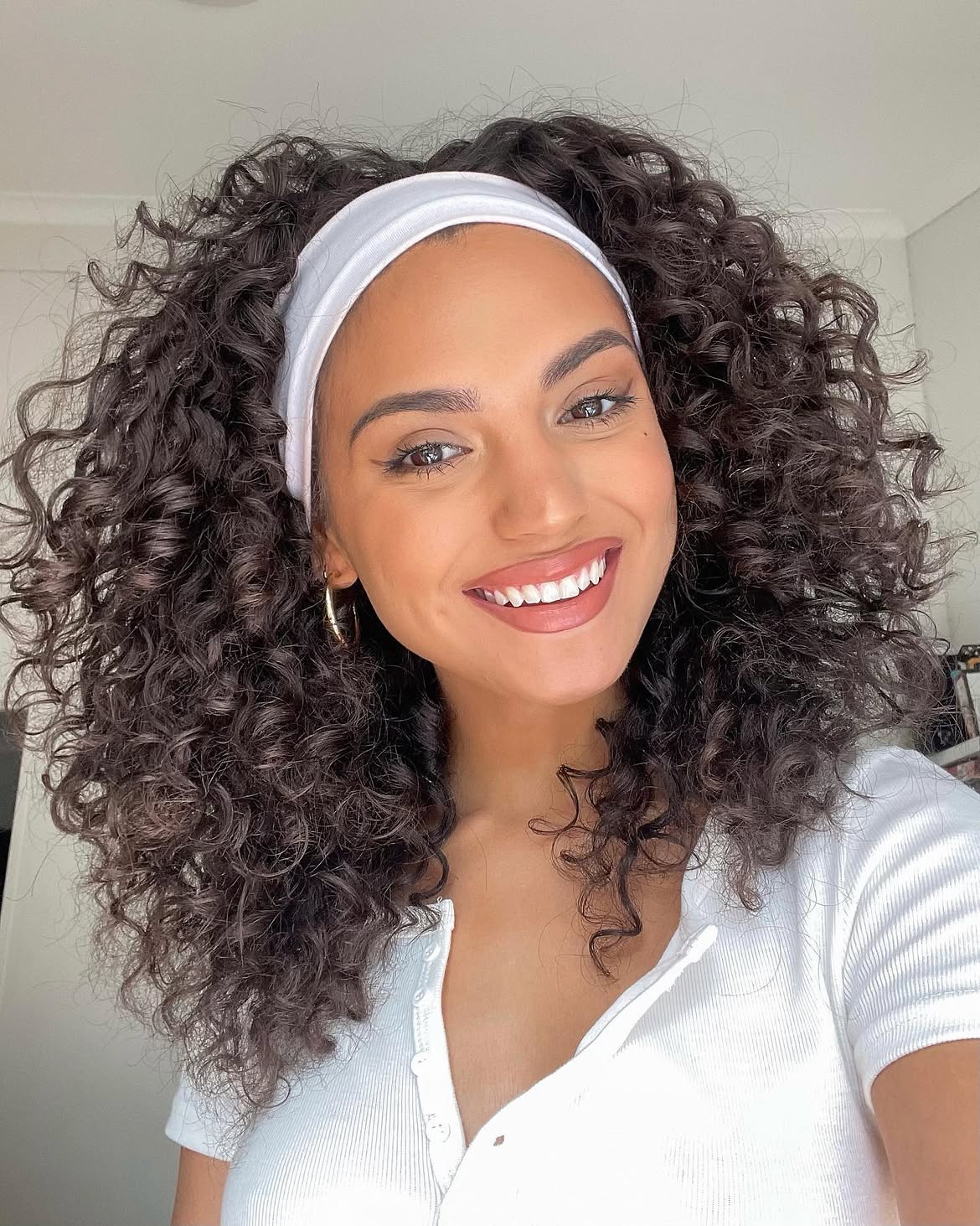 Defined Curly Hair With White Headband