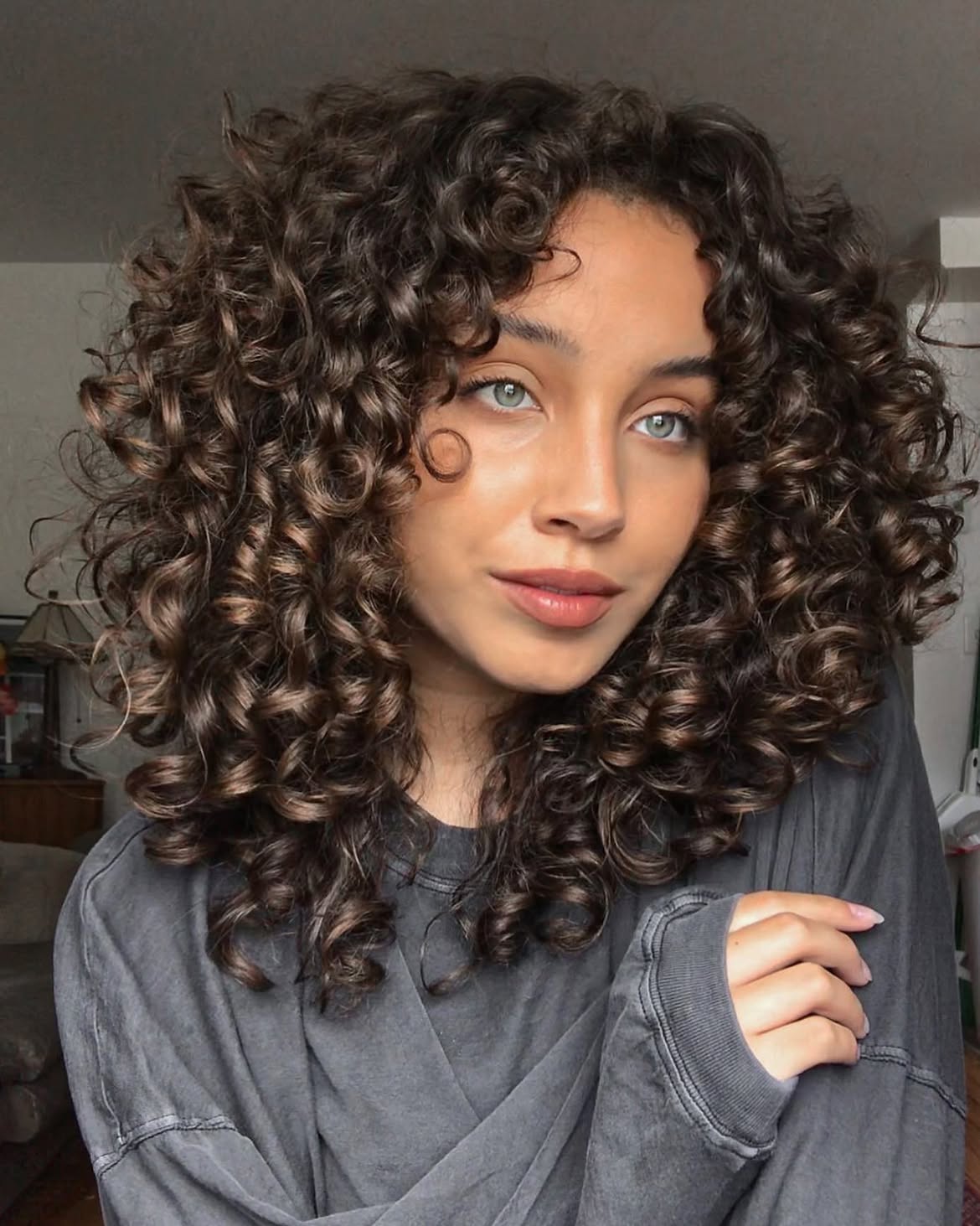 Defined Spiral Curls With Caramel Highlights