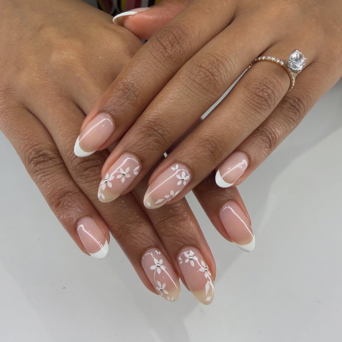 Delicate Floral French Almond Nails