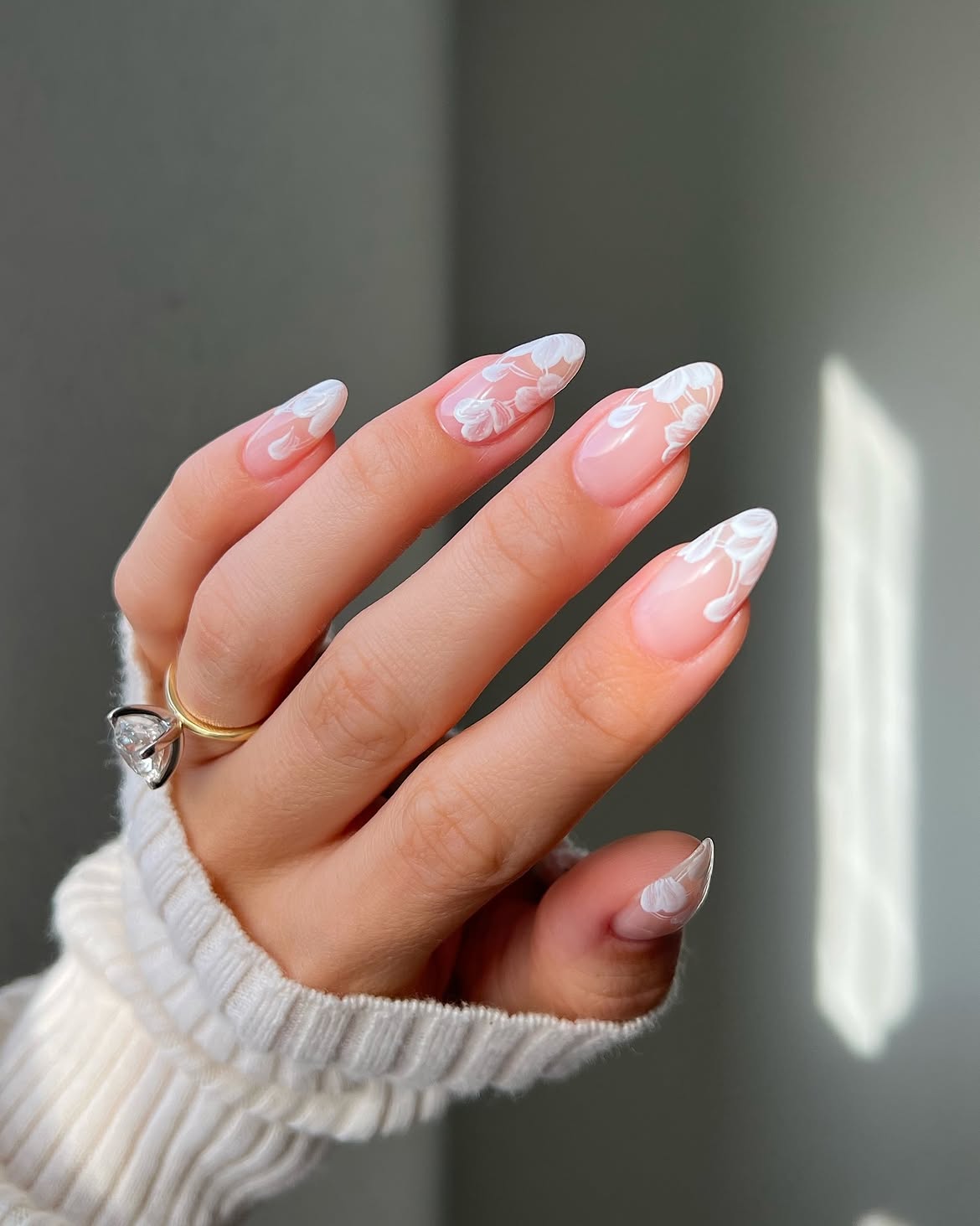 Delicate White Floral Almond Nails