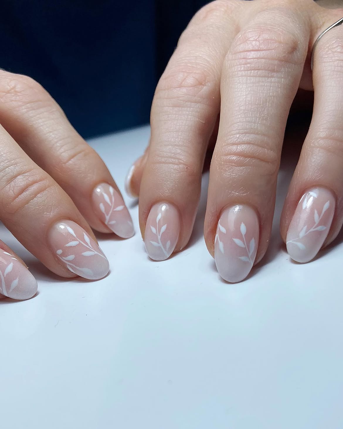 Delicate White Leaf French Ombre Almond Nails
