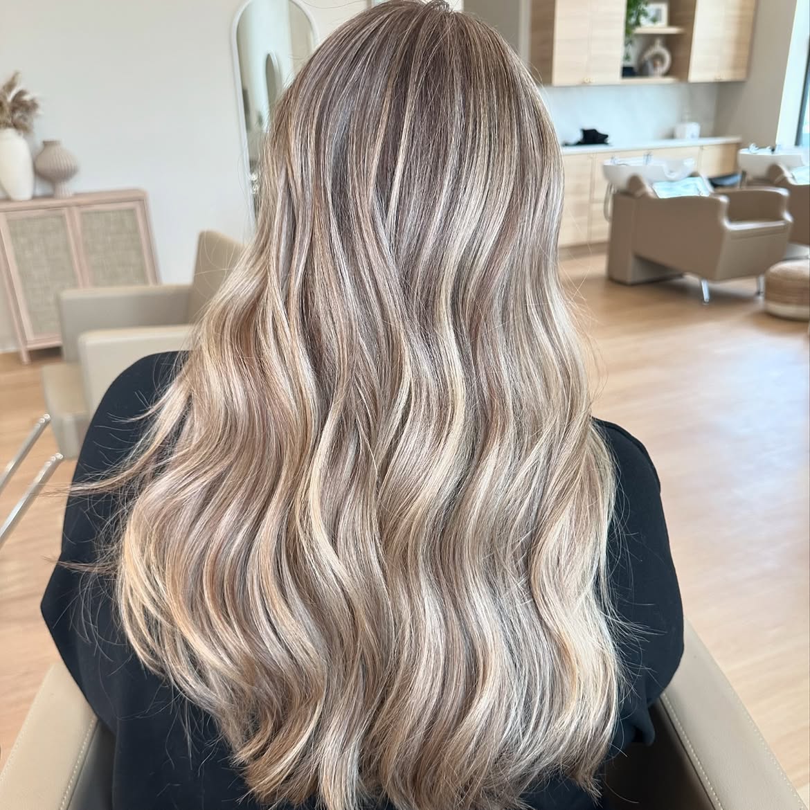 Dimensional Ash Blonde Highlights On Long Wavy Hair
