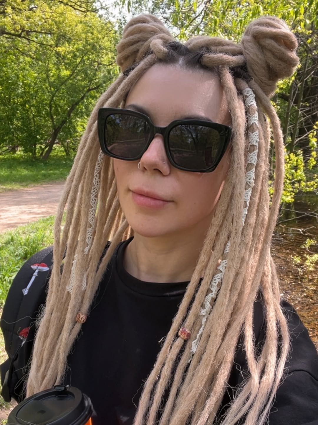 Double Space Buns On Ash Blonde Synthetic Dreads