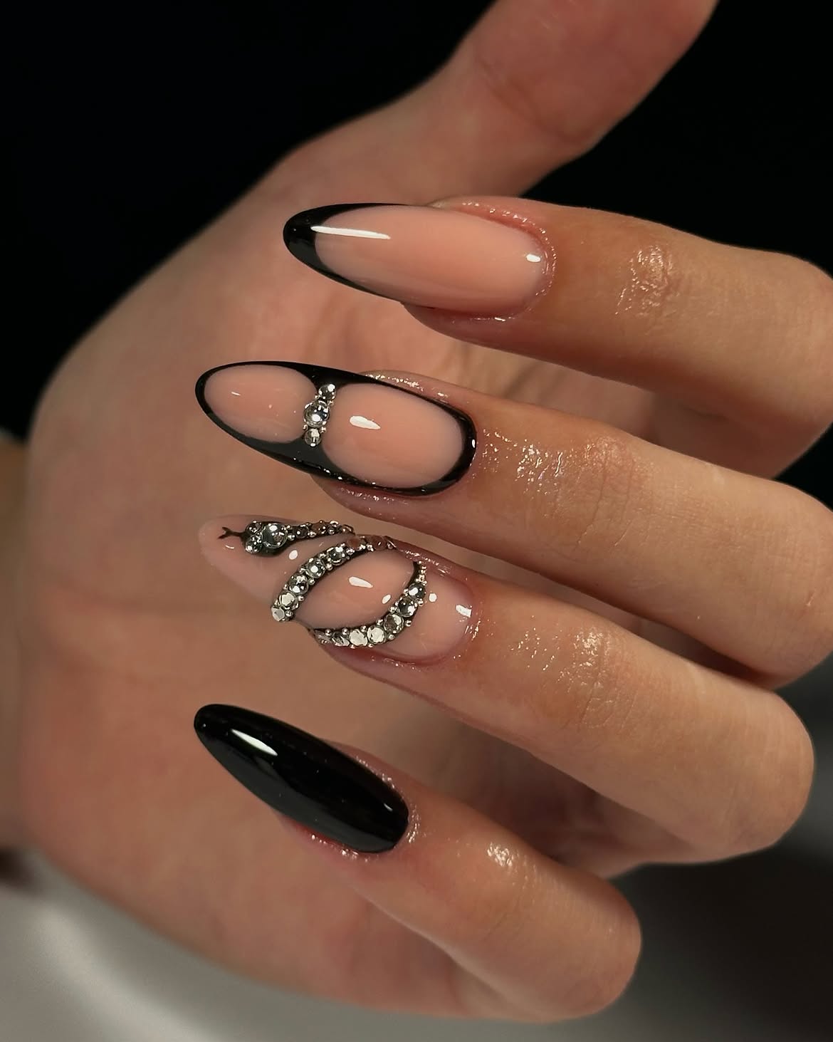 Edgy Black Snake Rhinestone Almond Nails