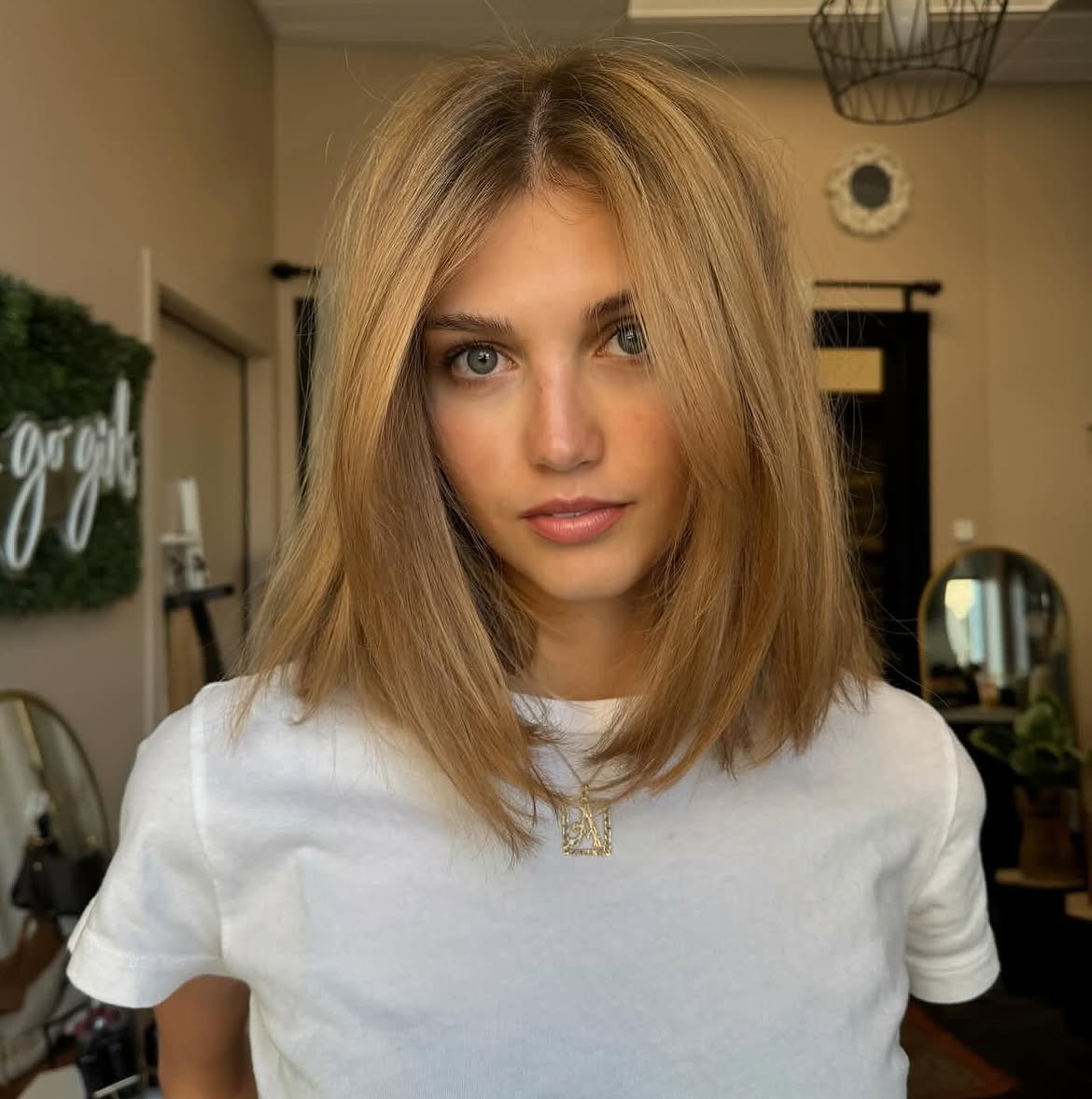 Effortless Honey Blonde Collarbone Cut With Face-Framing Layers