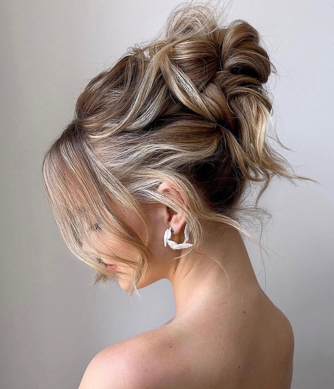 Effortless Messy Updo With Face-Framing Tendrils