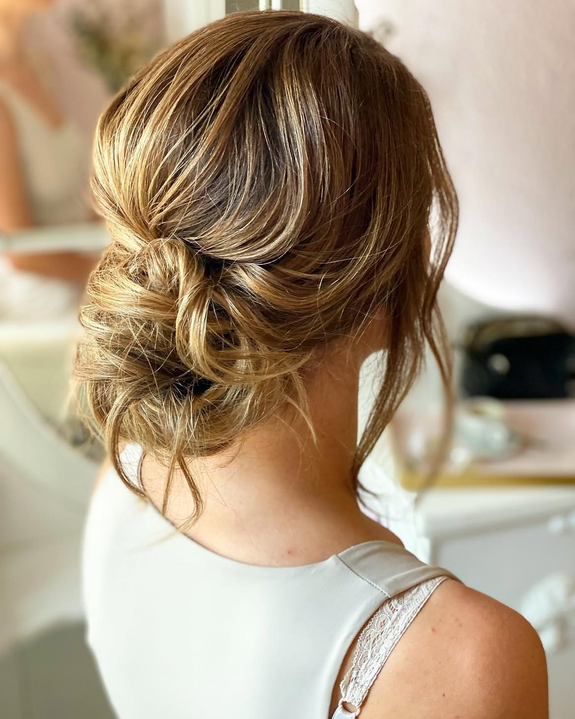 Effortless Twisted Chignon With Face-Framing Strands