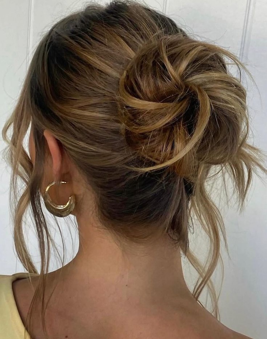Effortless Twisted Messy Bun With Face-Framing Strands