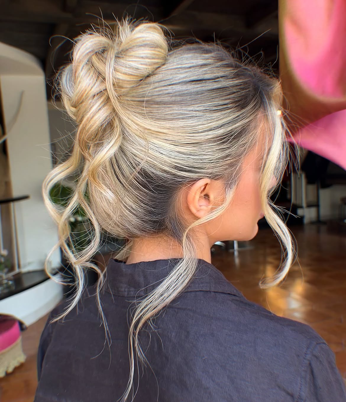 Elegant Blonde Twisted Updo With Loose Curls
