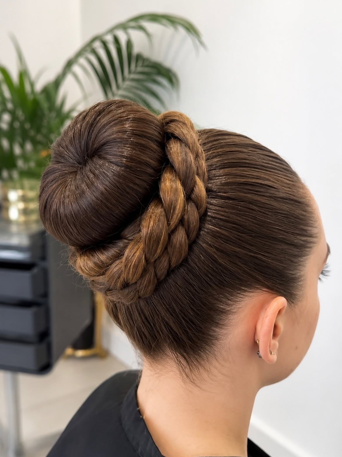 Elegant Braided Bun With Subtle Honey Highlights