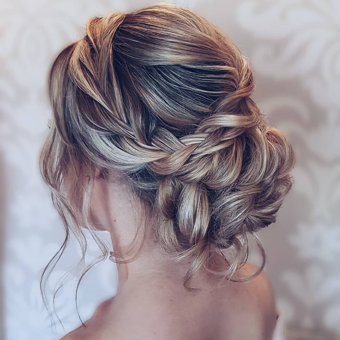 Elegant Braided Updo With Face-Framing Tendrils