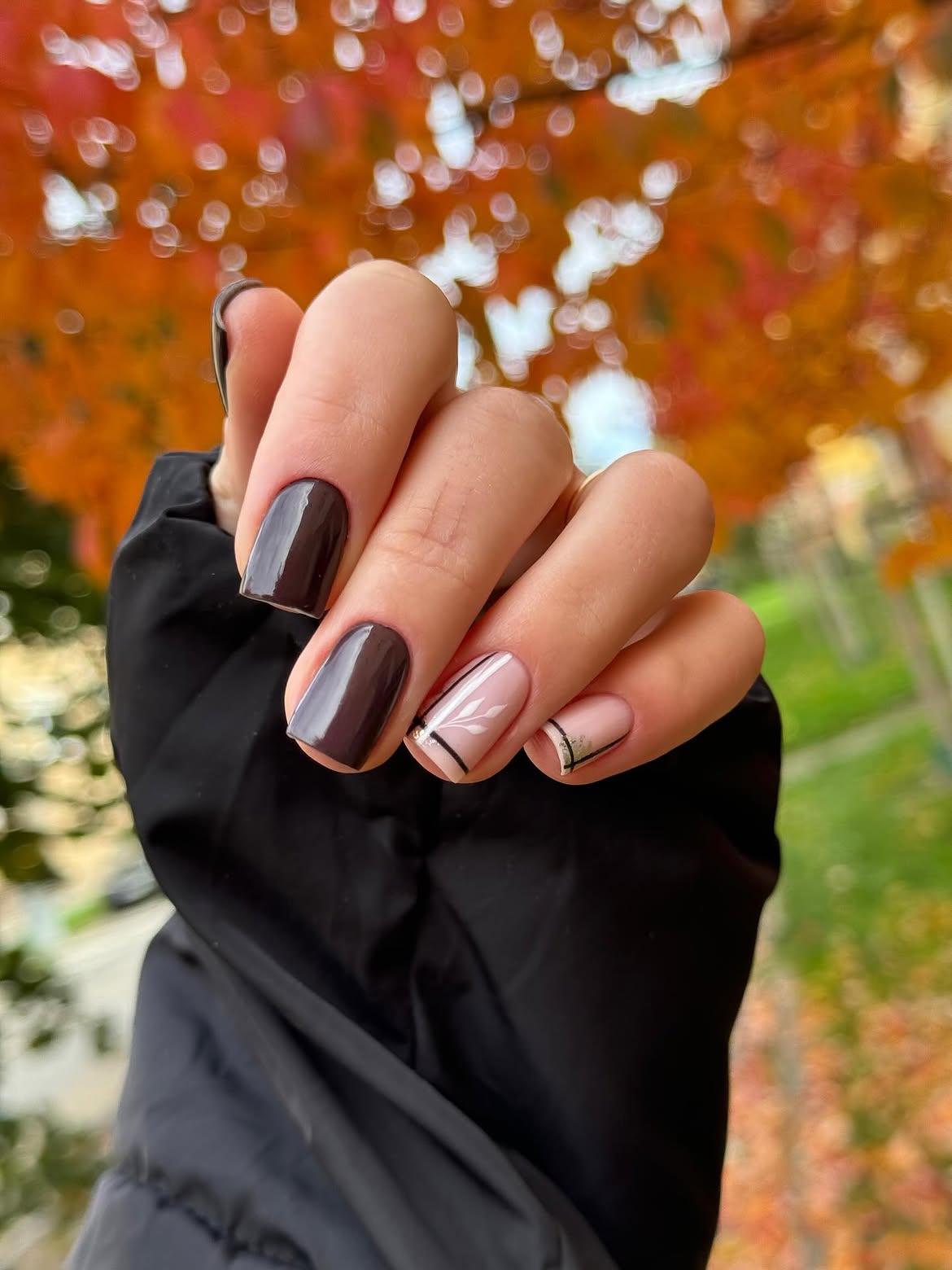 Elegant Chocolate & Nude Floral Accent Nails