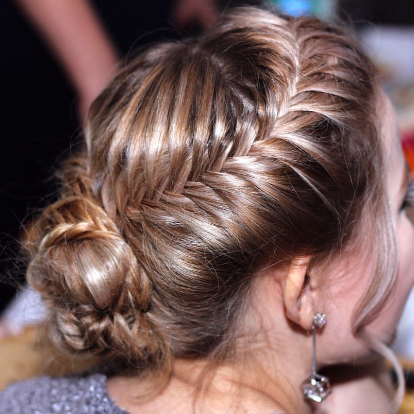 Elegant Fishtail Braid Updo With Soft Texture