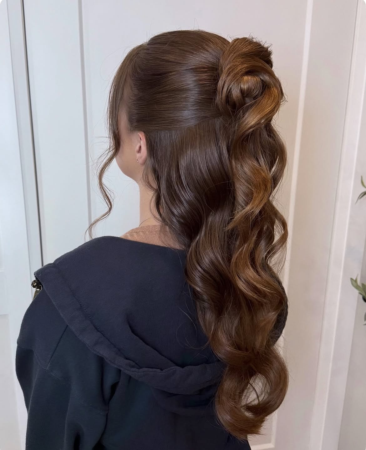 Elegant Half-Up Twisted Bun With Loose Waves