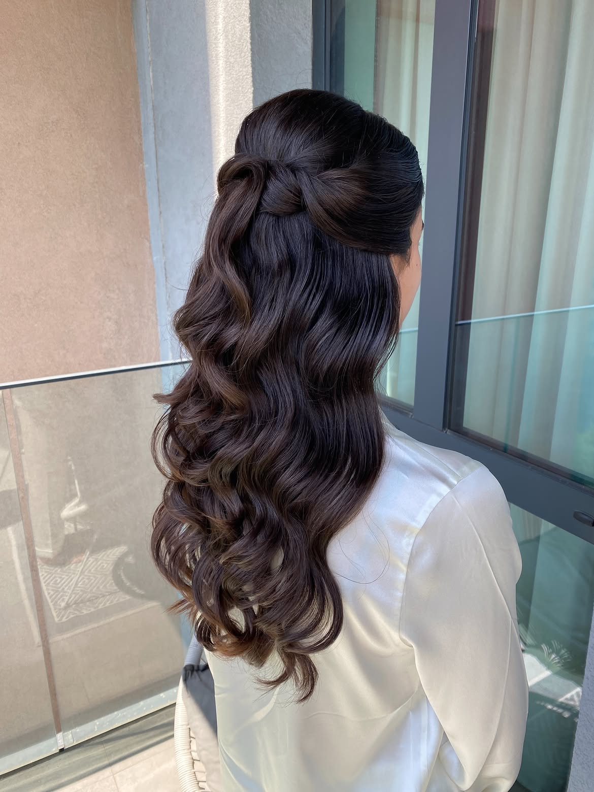 Elegant Twisted Half-Up With Loose Waves