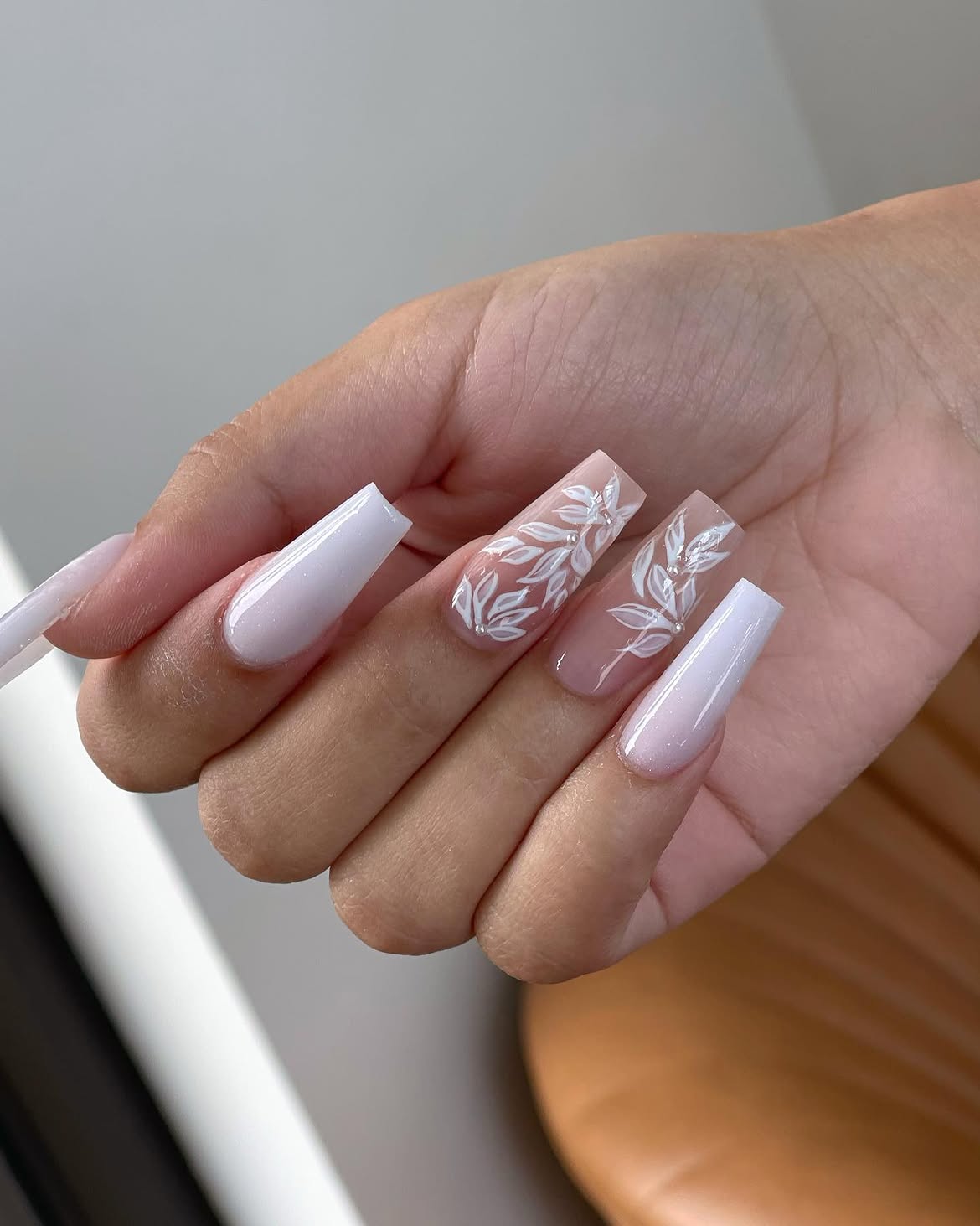 Elegant White Floral Ombre Coffin Nails
