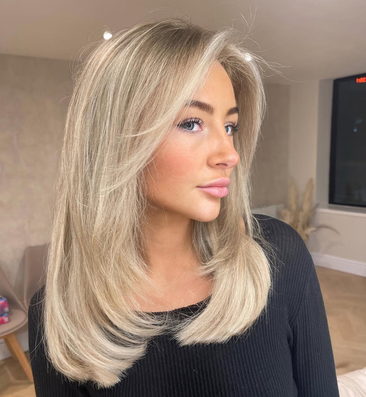 Face Framing Layers On Bright Ash Blonde Blowout