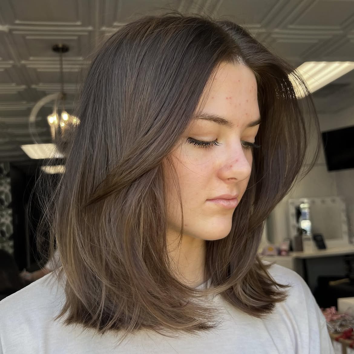 Face-Framing Layers With Subtle Brown Balayage