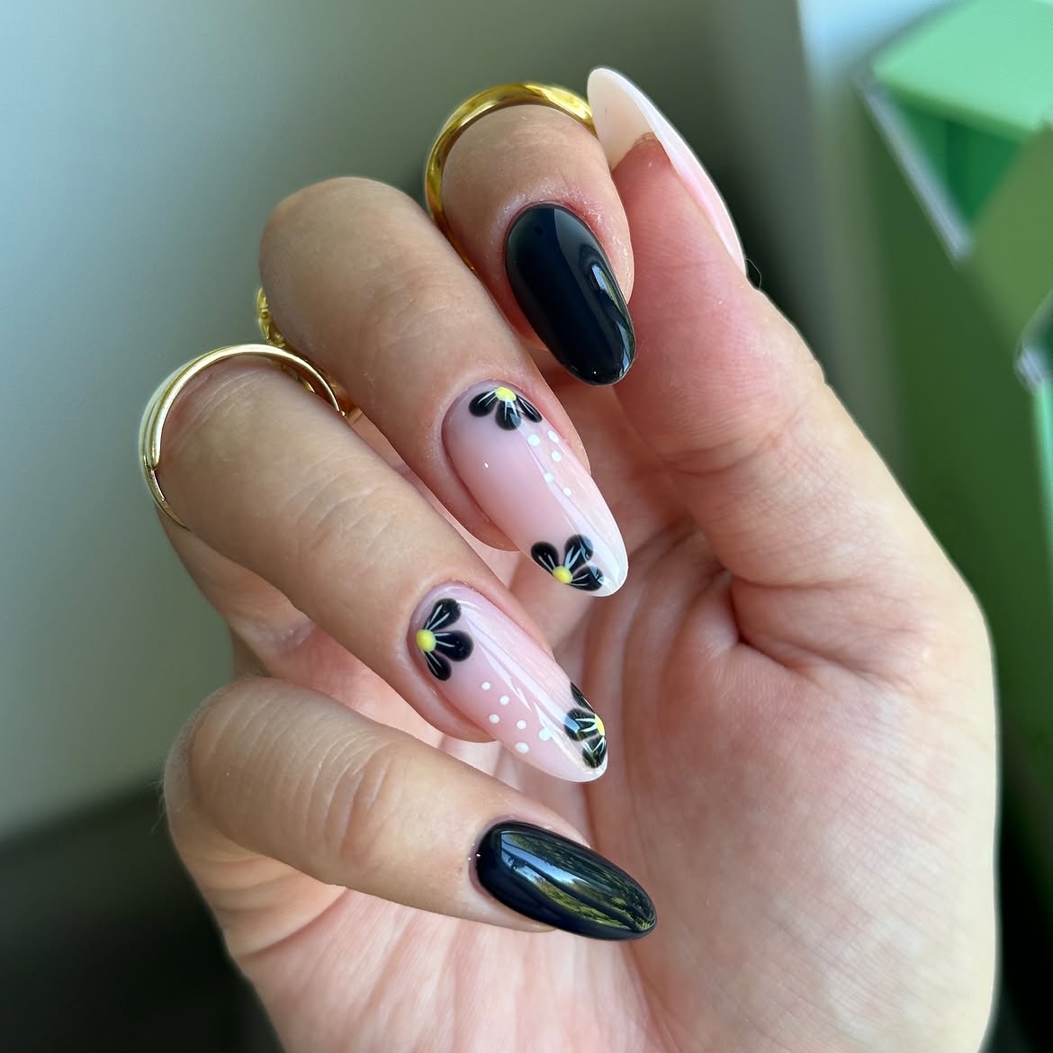 Glossy Black and Floral French Tip Almond Nails