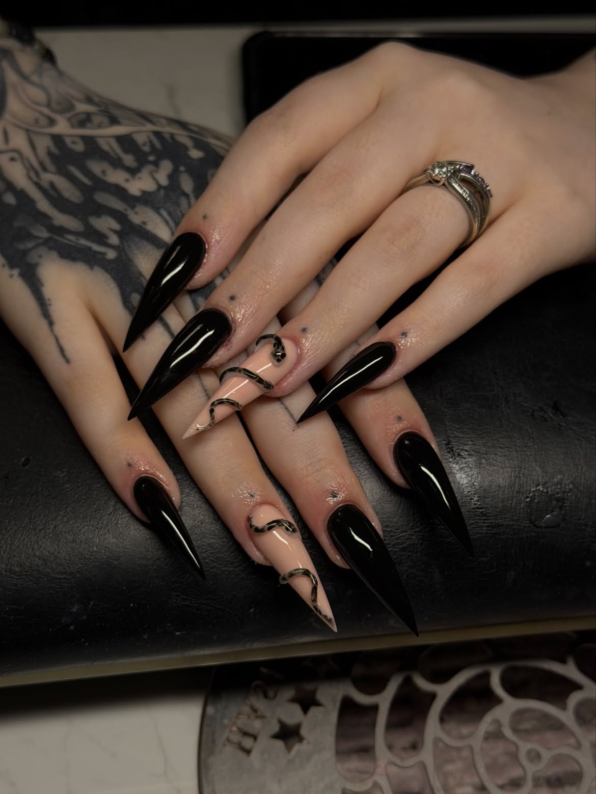 Glossy Black Snake Swirl Stiletto Nails
