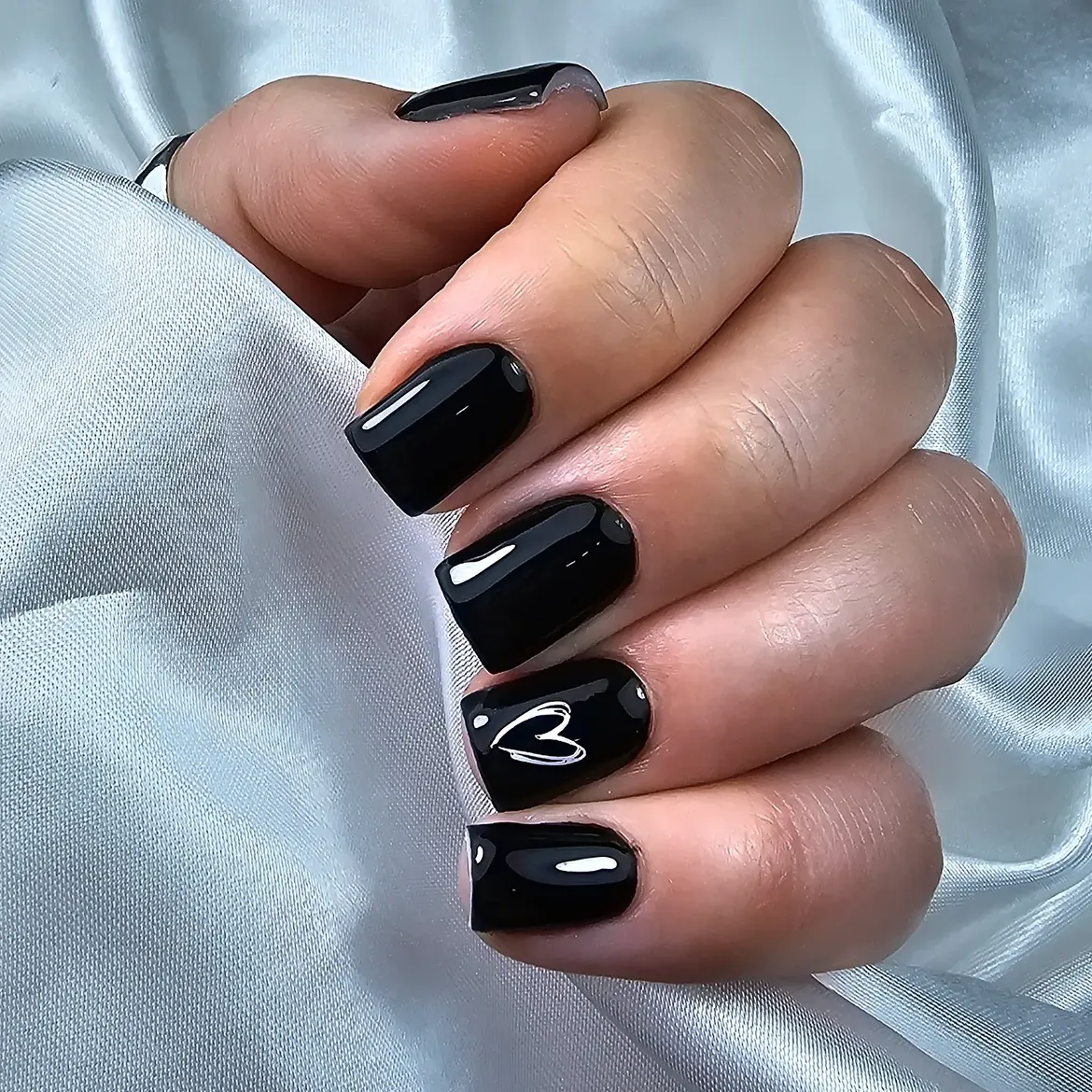 Glossy Black Square Nails with White Heart Accent