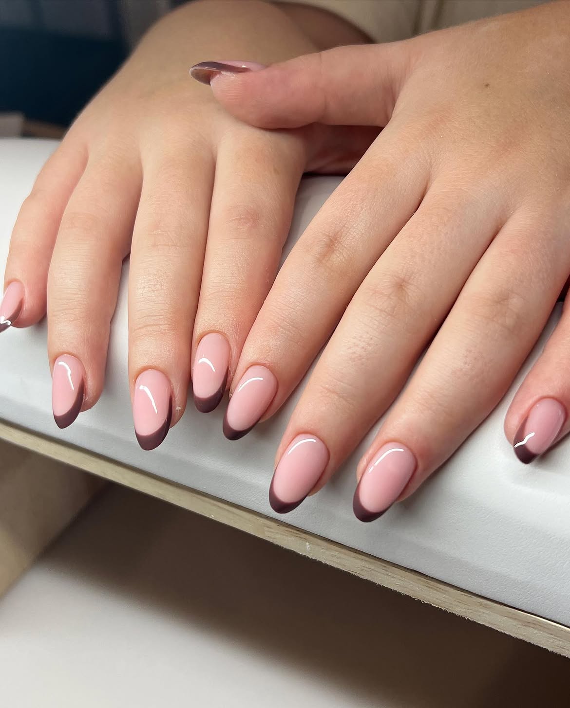 Glossy Chocolate Brown French Tip Almond Nails
