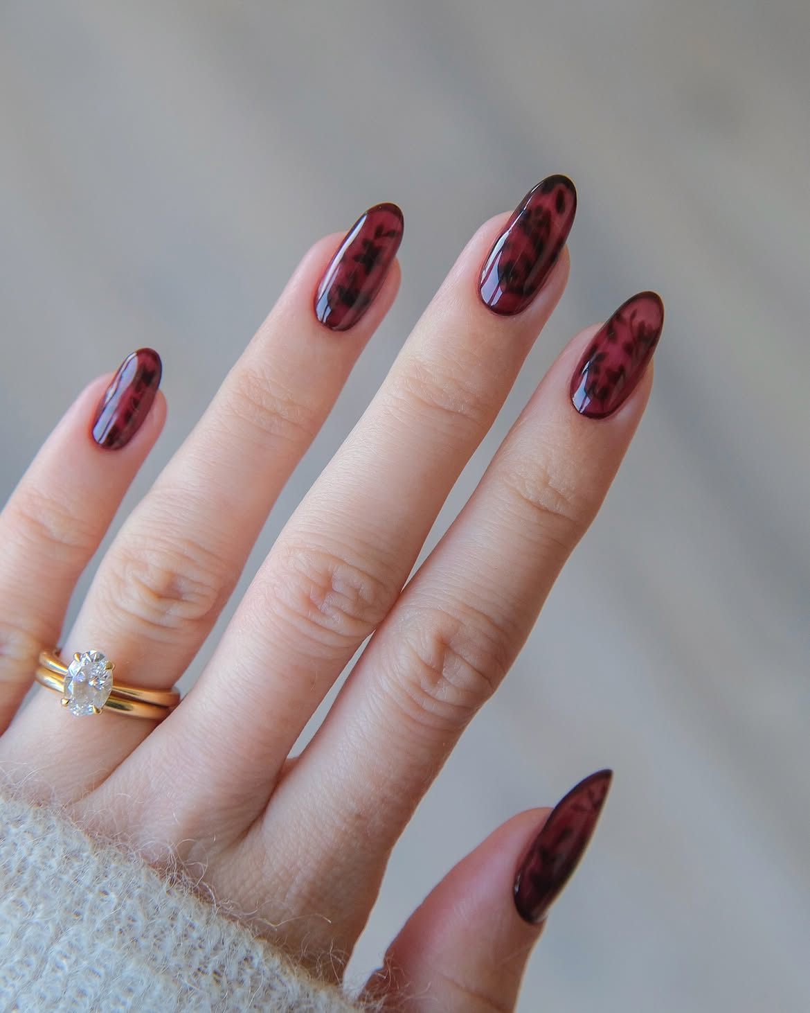 Glossy Deep Cherry Tortoiseshell Almond Nails