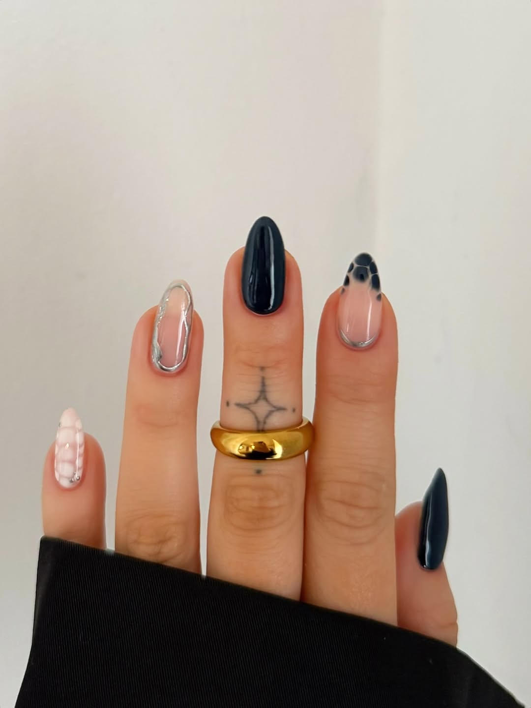 Glossy Navy Almond Nails with Abstract French