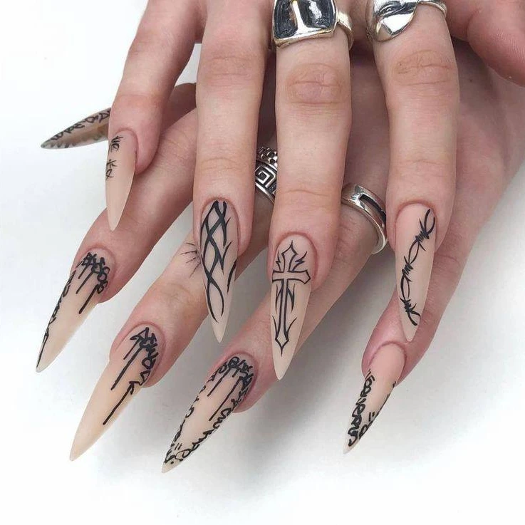 Gothic Nude Stiletto Nails with Black Outline Art