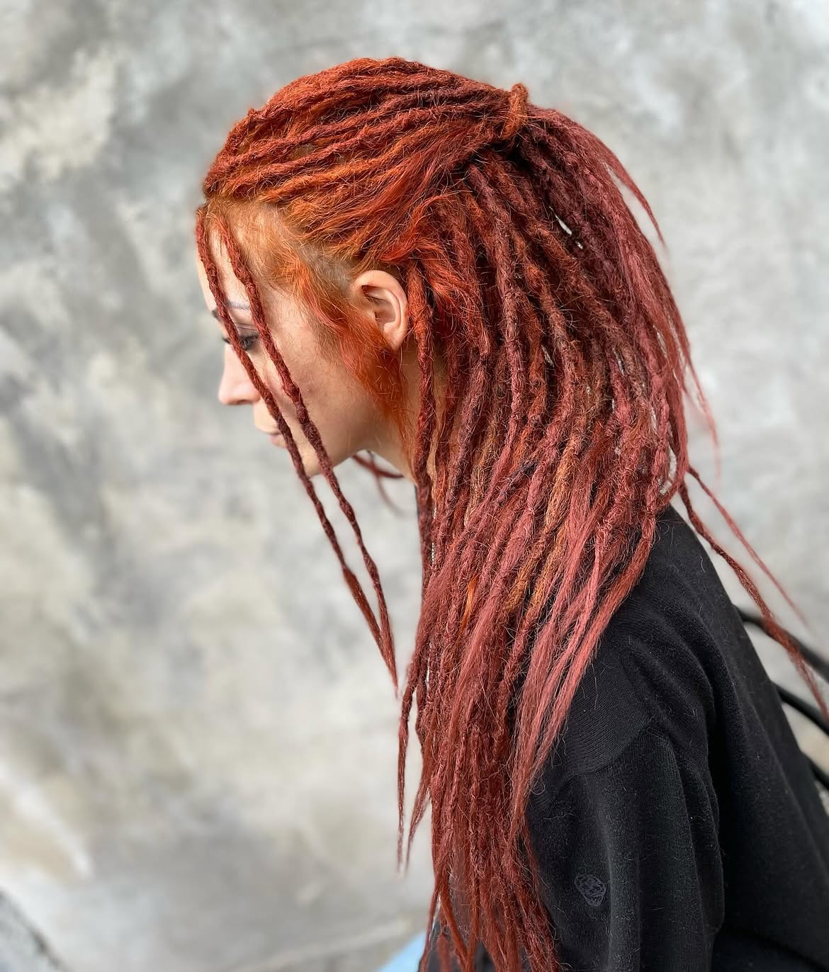 Half Up Copper Dreads With Face Framing Tendrils