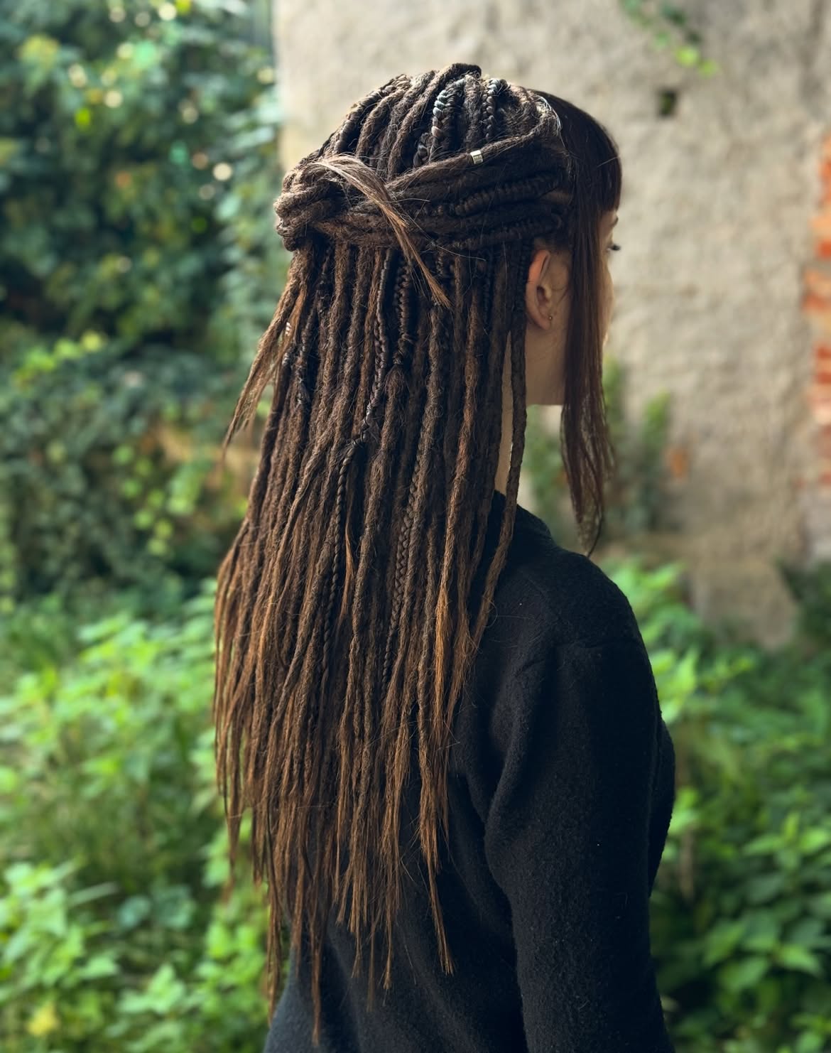 Half Up Half Down Dreadlock Style With Blunt Bangs