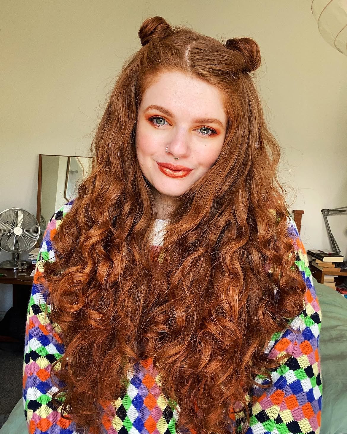 Half Up Space Buns On Long Copper Curls
