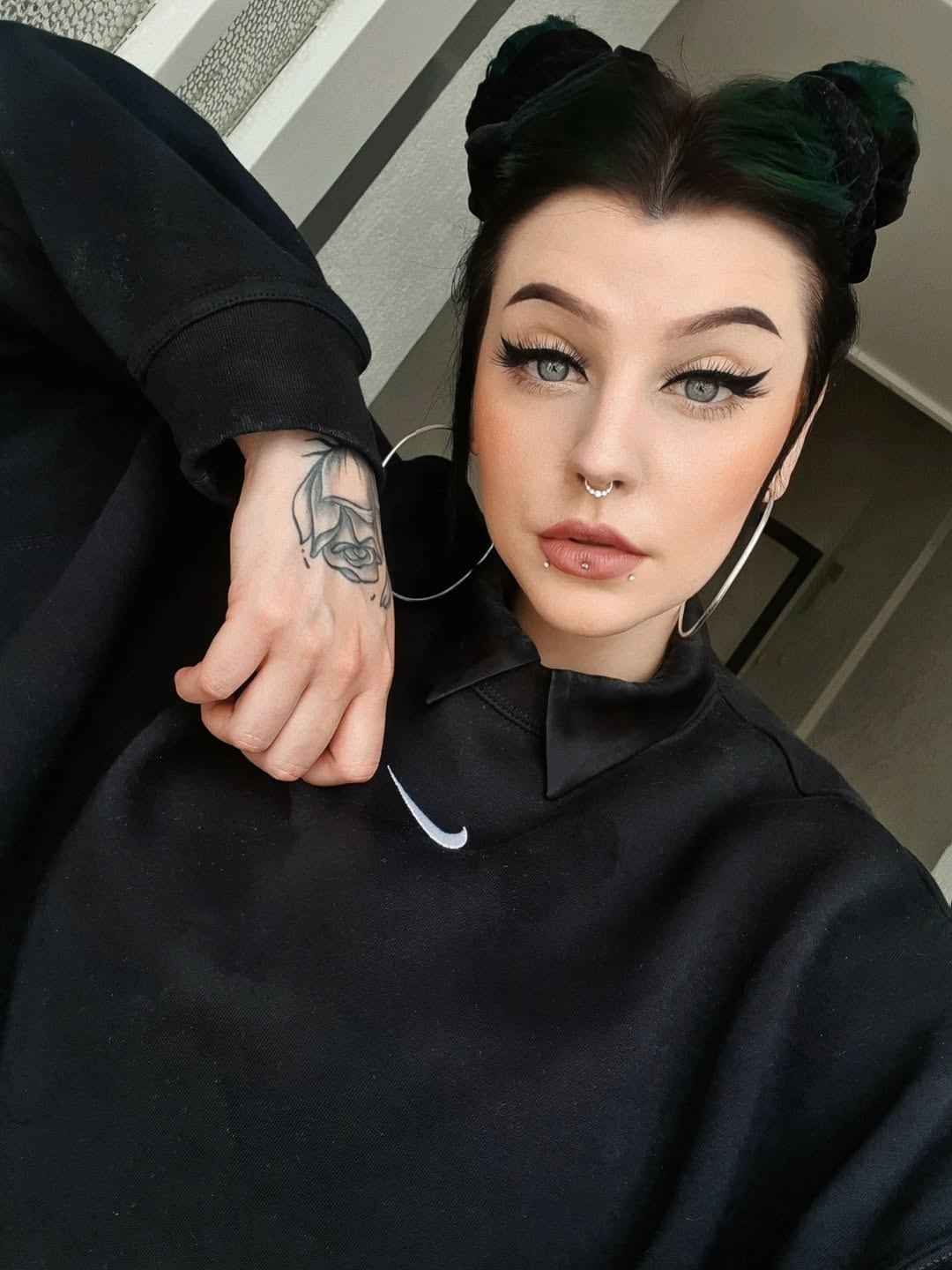 High Space Buns With Velvet Scrunchies And Green Tones