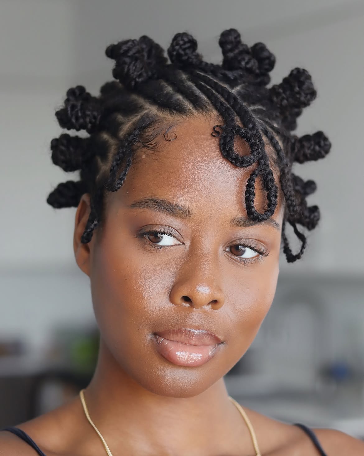 Intricate Bantu Knots With Detailed Parting