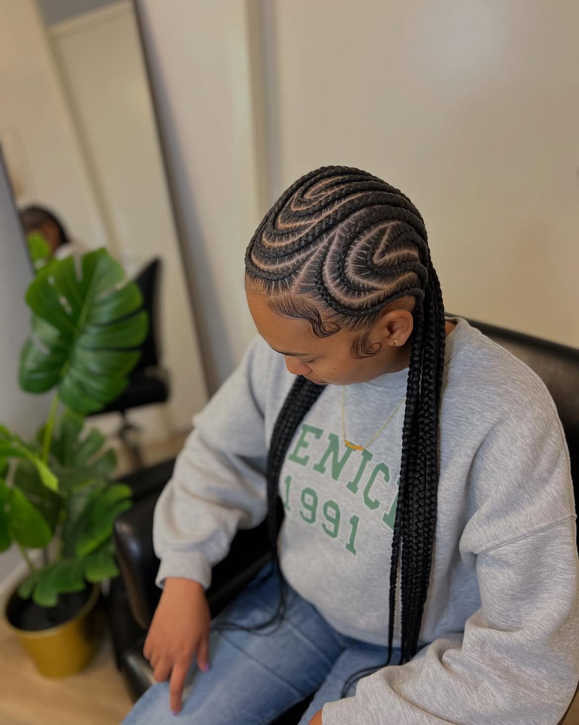 Intricate Swirl Pattern Feed In Cornrow Braids