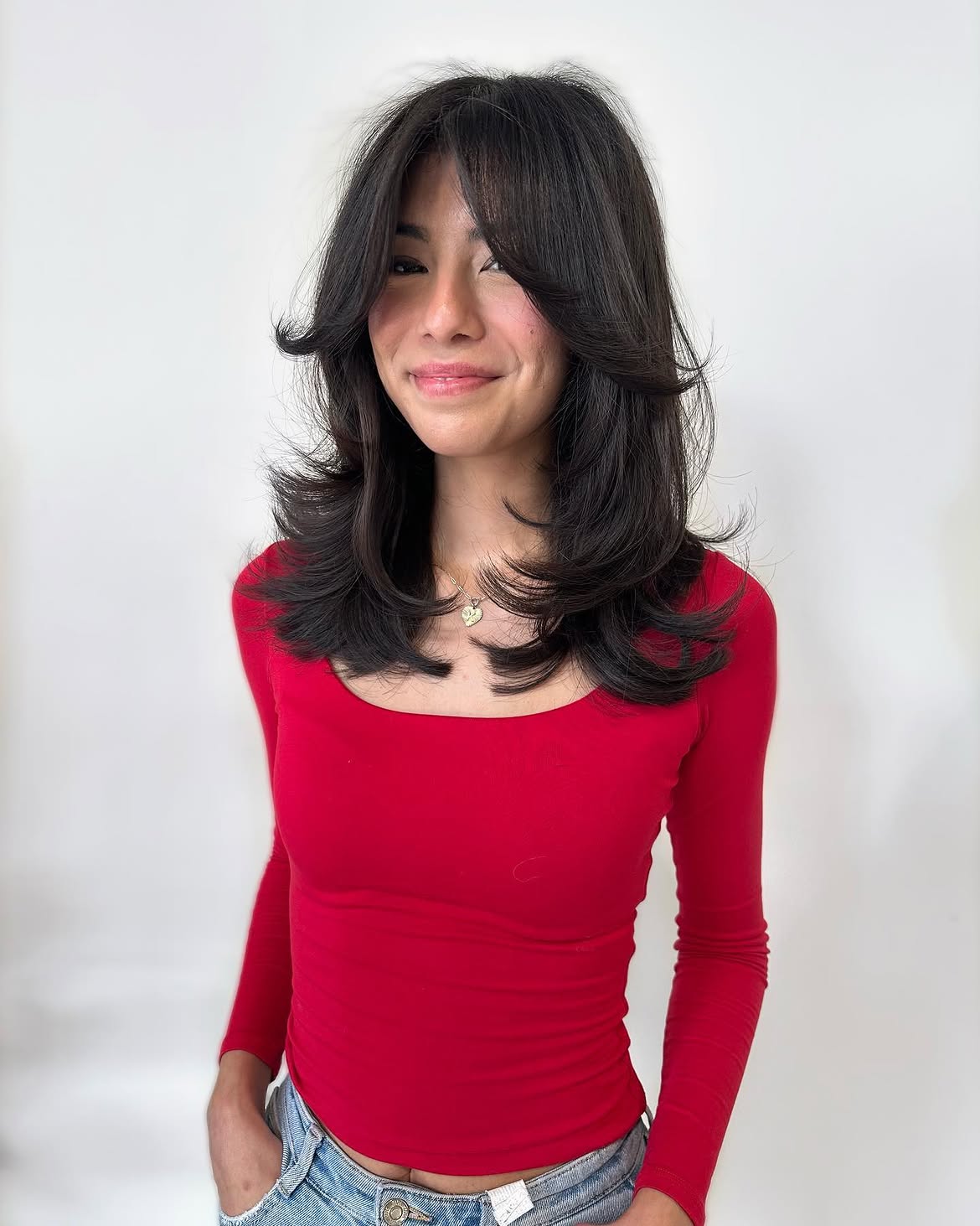 Layered Butterfly Cut With Face-Framing Bangs
