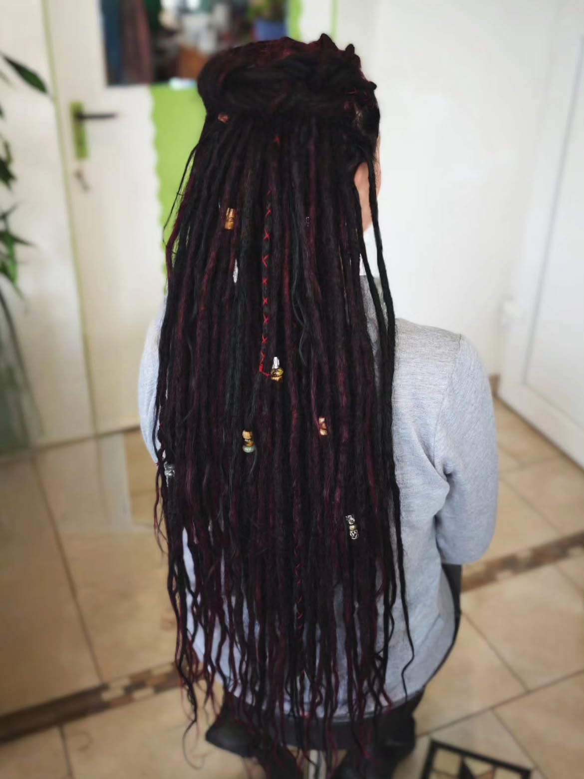Long Black And Burgundy Dreads With Boho Accessories