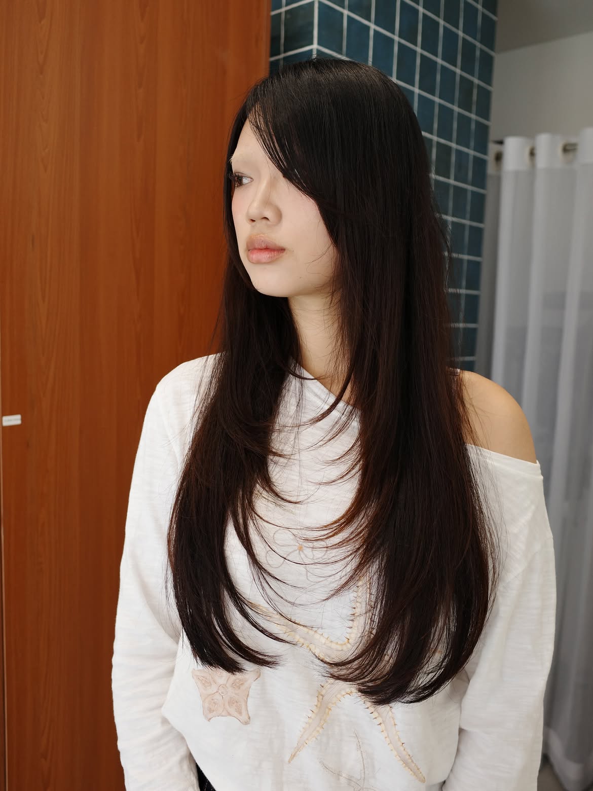 Long Layered Hair With Wispy Side Swept Bangs