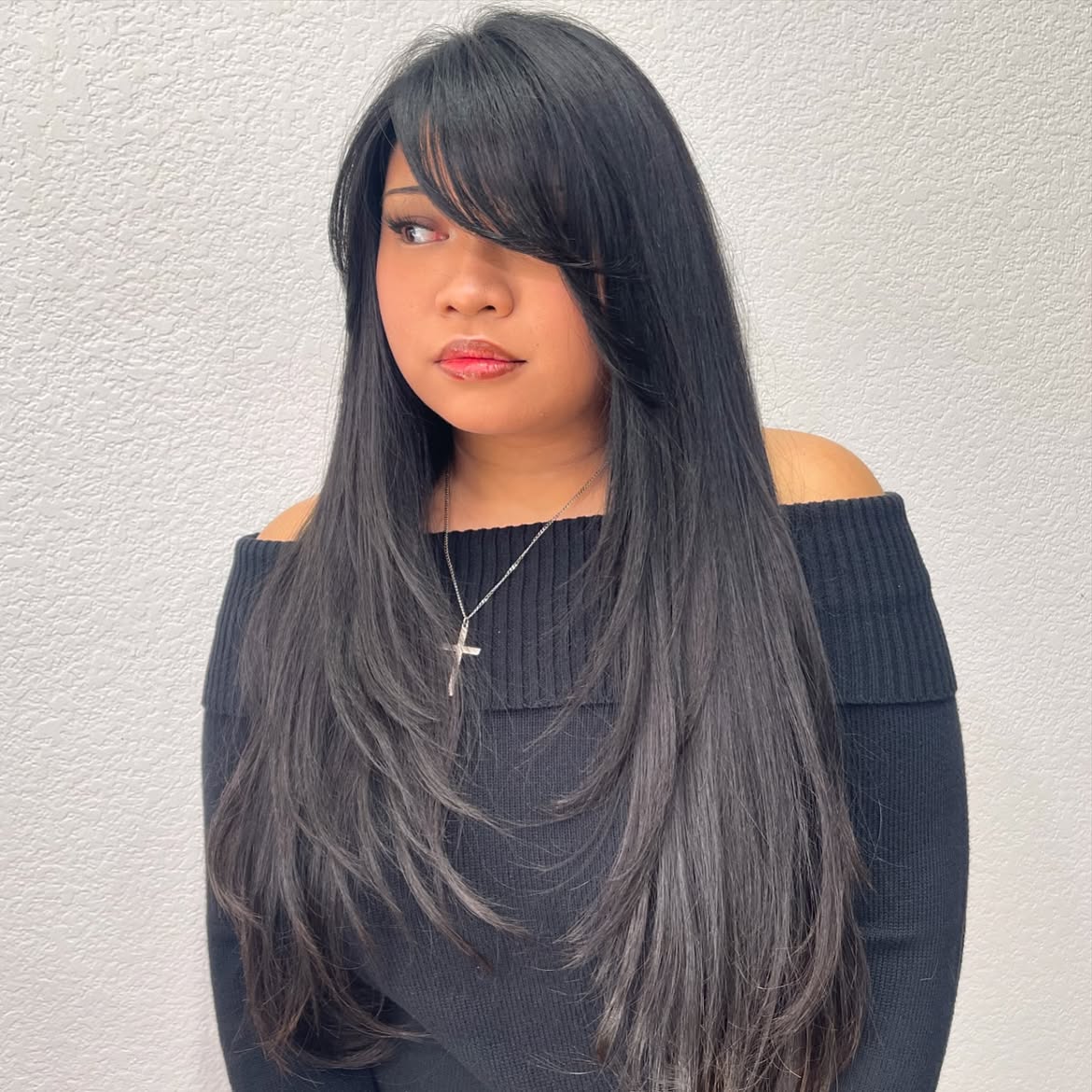 Long Layered Haircut With Side Swept Bangs