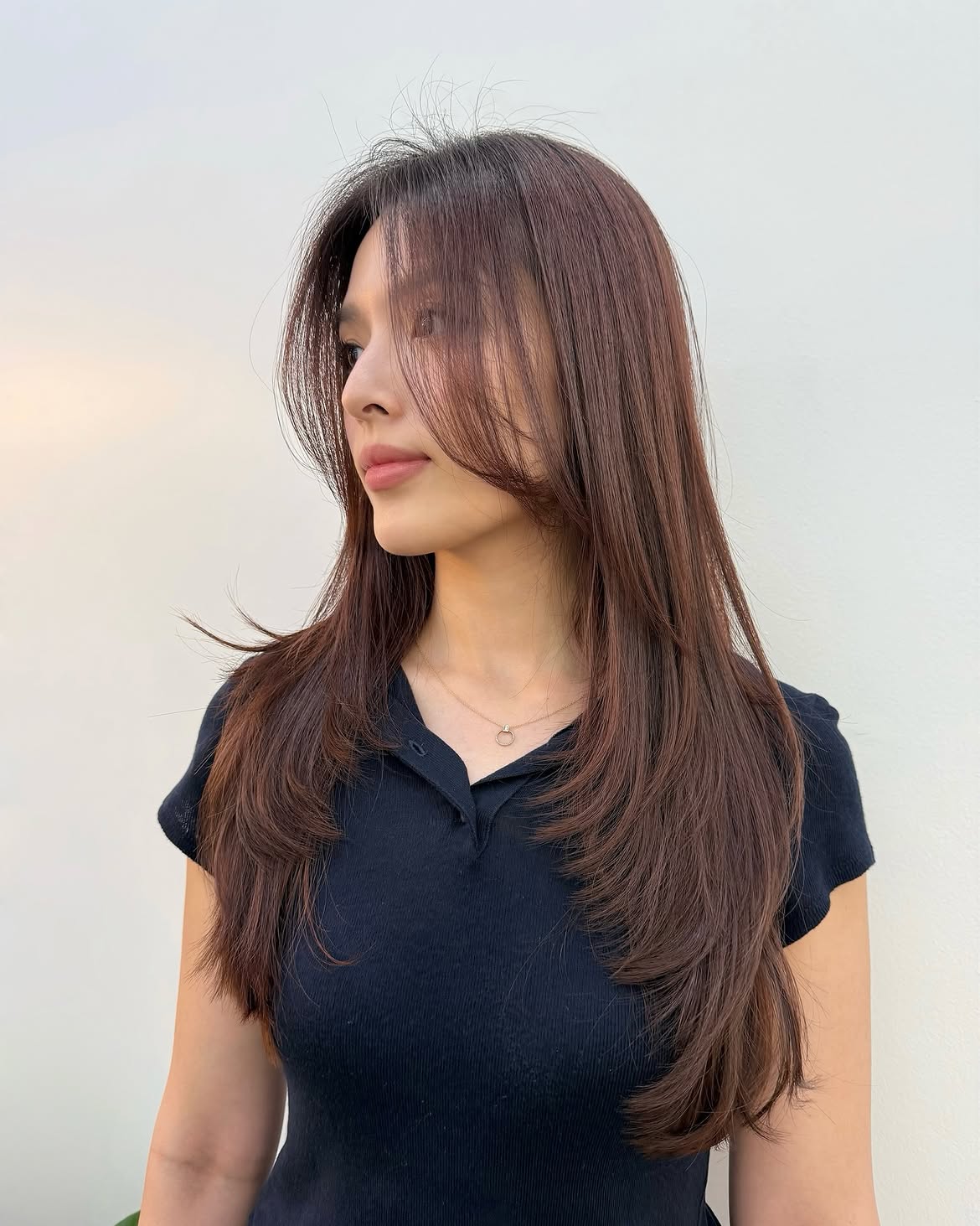 Long Layers With Soft Feathered Curtain Bangs