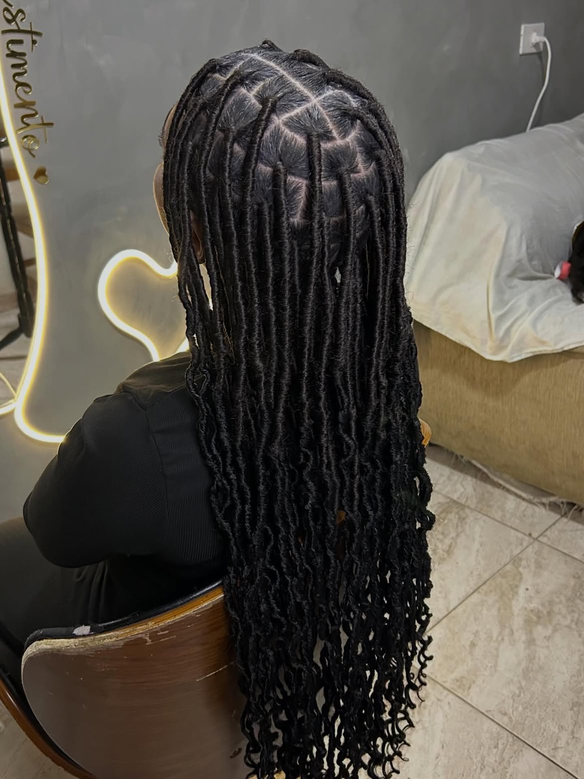 Long Wavy Faux Locs With Clean Parting