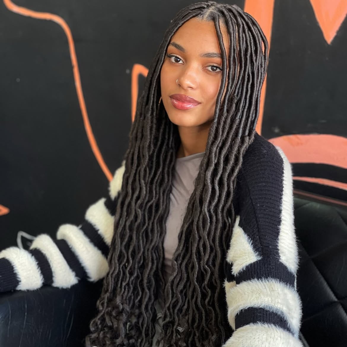 Long Wavy Faux Locs With Middle Part