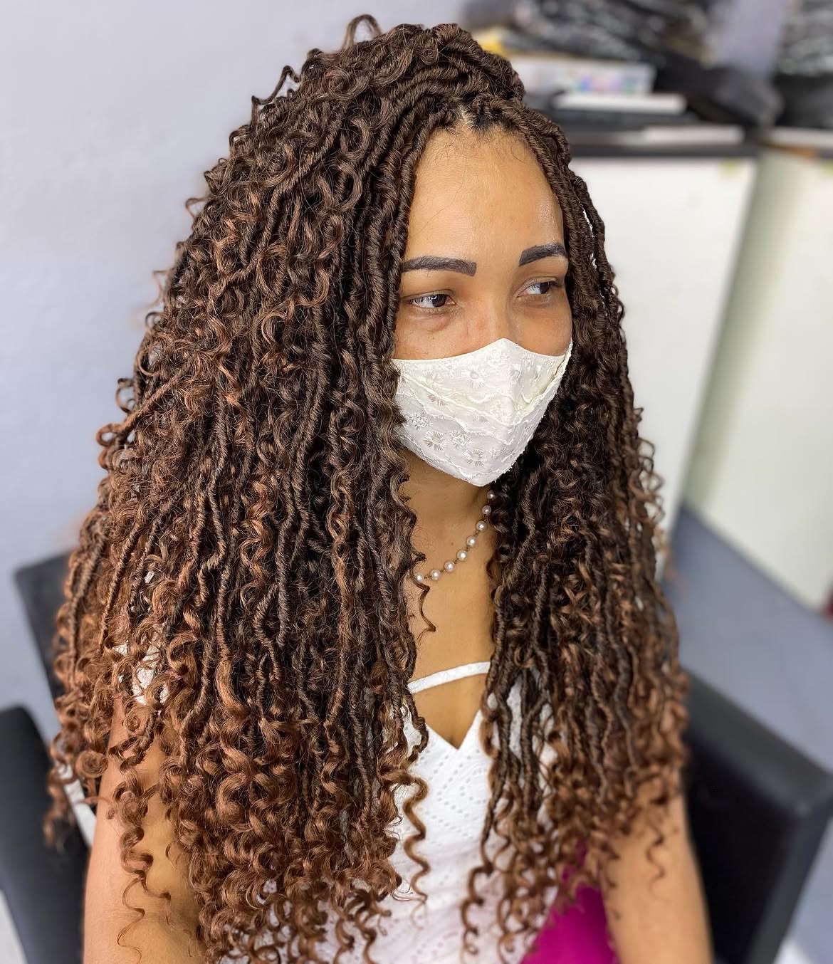Long Wavy Goddess Faux Locs In Warm Brown