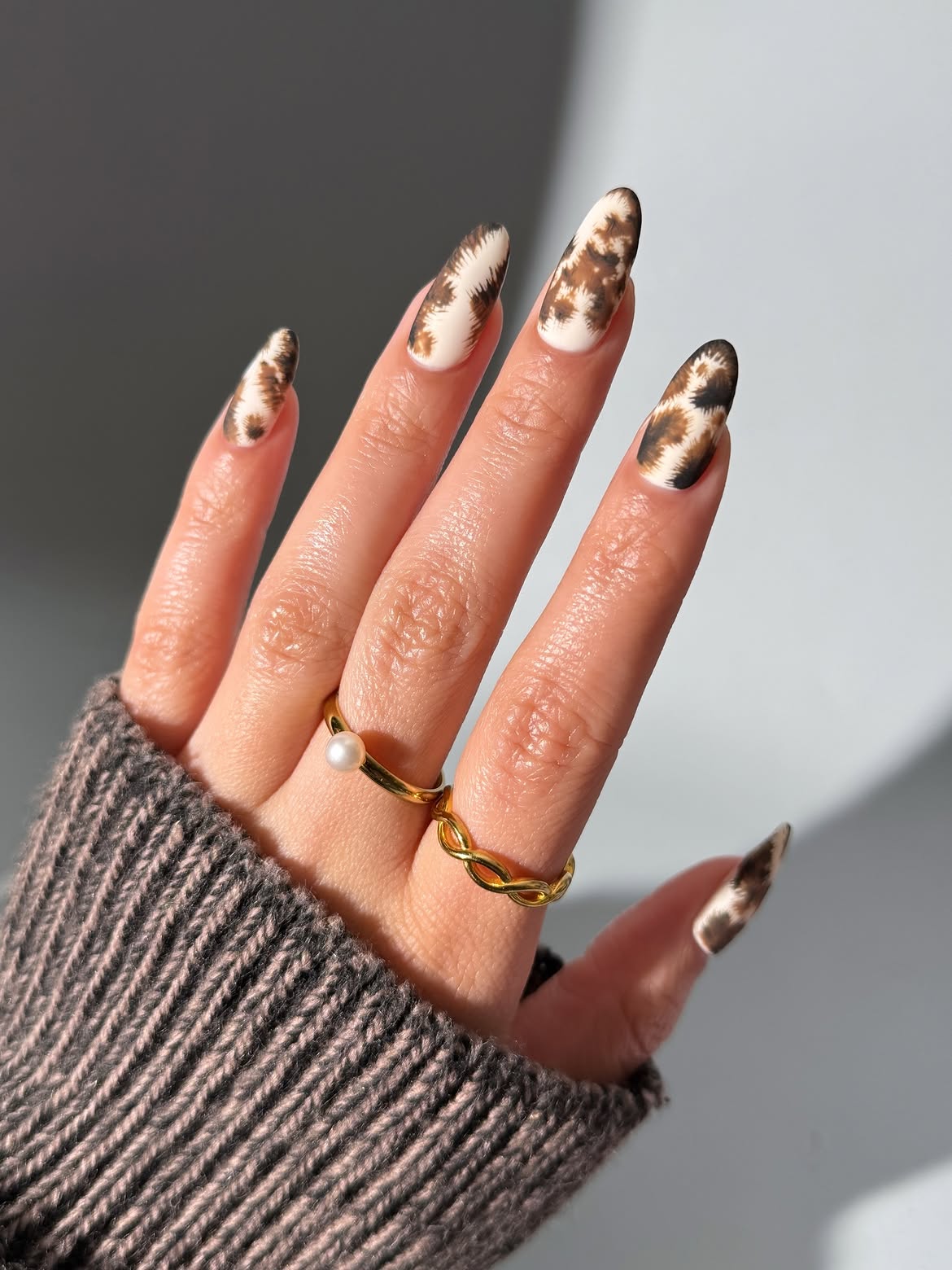 Matte Cow Print Almond Nails