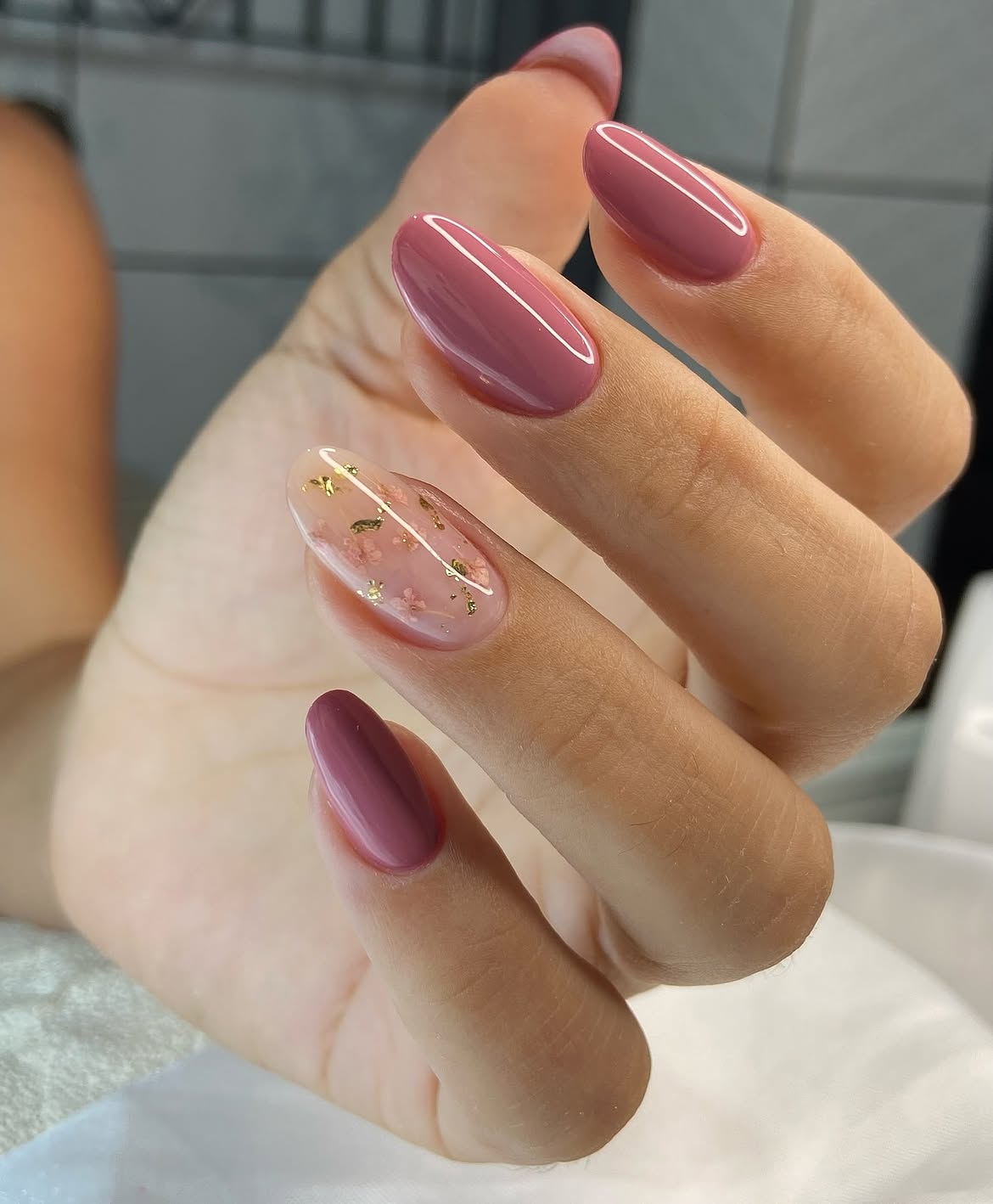 Mauve Oval Nails With Gold Foil Accents