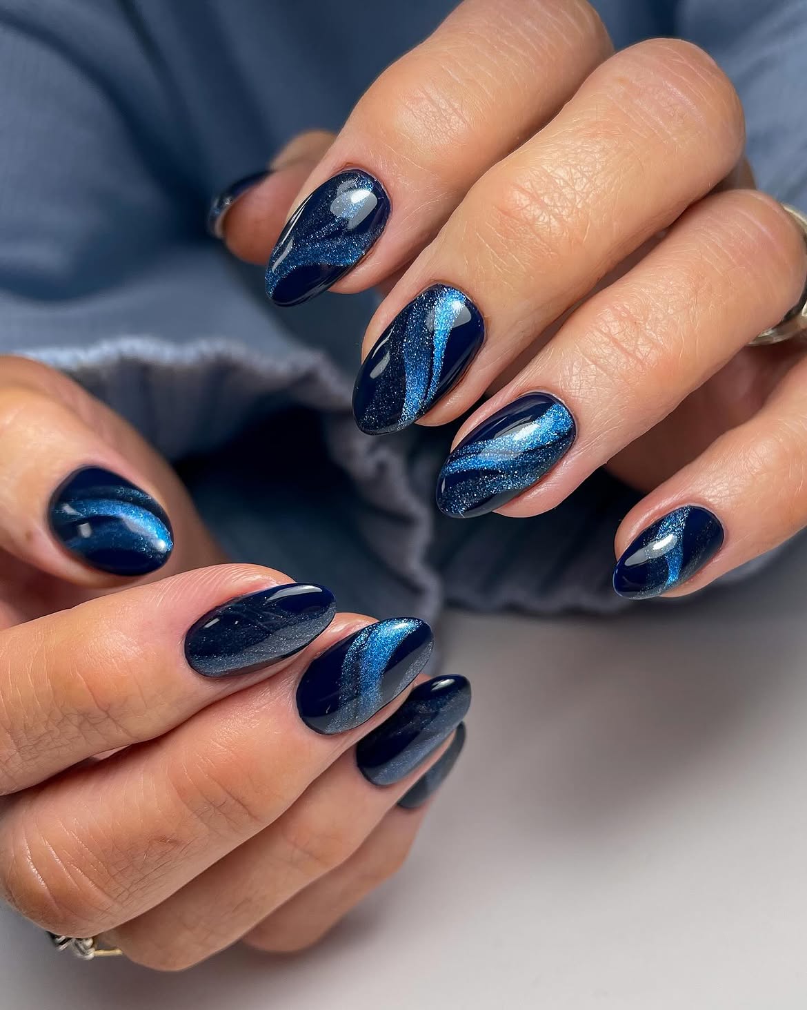 Midnight Blue Cat Eye Swirl Nails