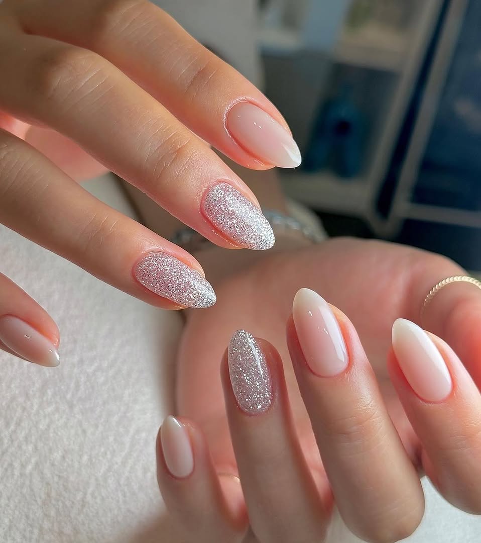 Milky Nude Almond Nails with Glitter Accents