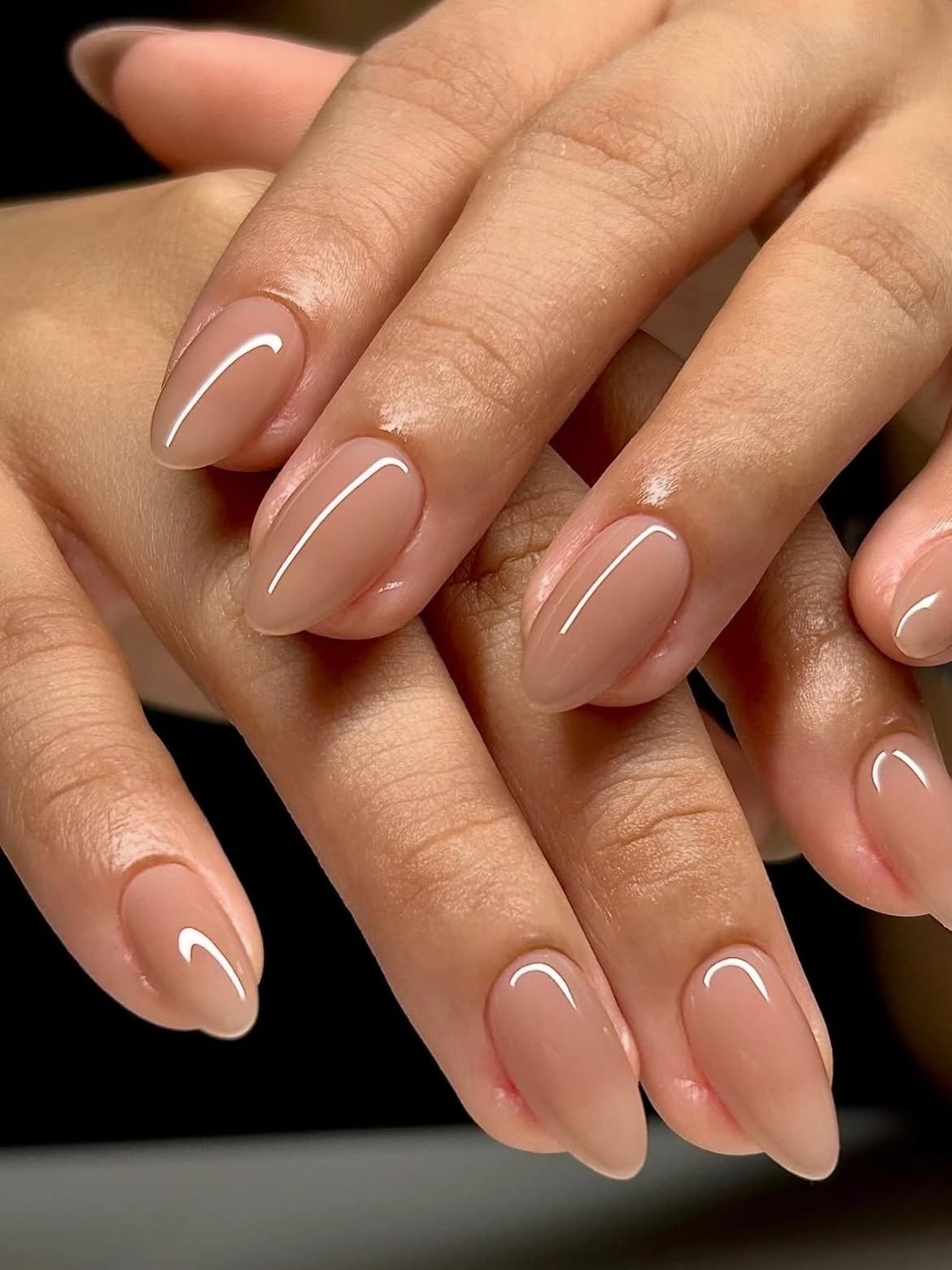Milky Nude Almond Nails with Subtle White Crescent